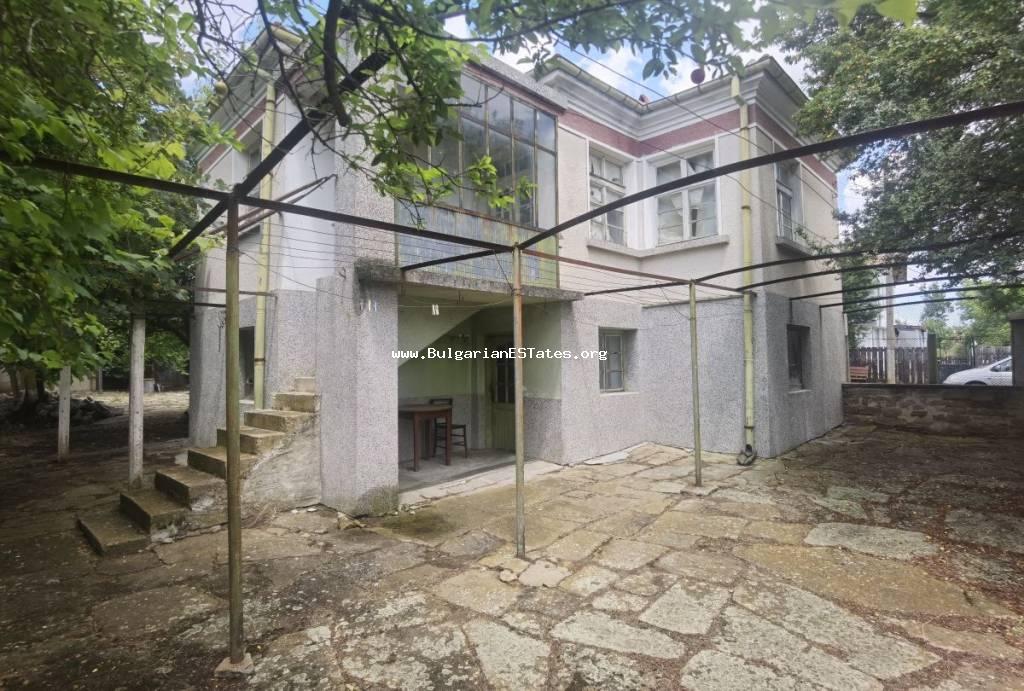 For sale is a massive two-storey house with many additional buildings and a large yard in the village of Svetlina, only 35 km from the city of Bourgas and the sea.