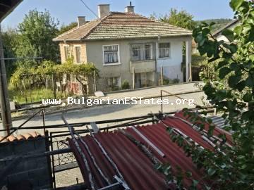 Massive two-storey house is for sale in the village of Bulgari, only 18 km from the town of Tsarevo and the sea, 40 km from the town of Malko Tarnovo and the border with Turkey, 80 km from the city of Bourgas, Bulgaria!